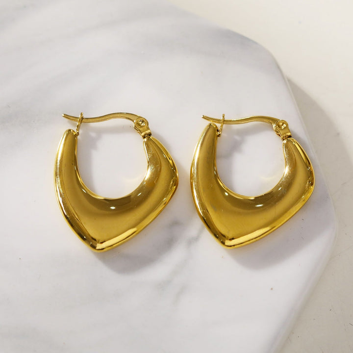 KAMIRA: Geometric Fusion Assymetrical Hoop Earrings